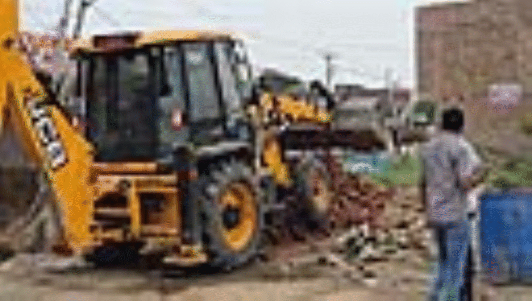 Jind Demolition Jind: Illegal construction demolished in two places; DTP's yellow paw used in 7.27 acres Jind: Illegal construction demolished in two places; DTP's yellow paw used in 7.27 acres